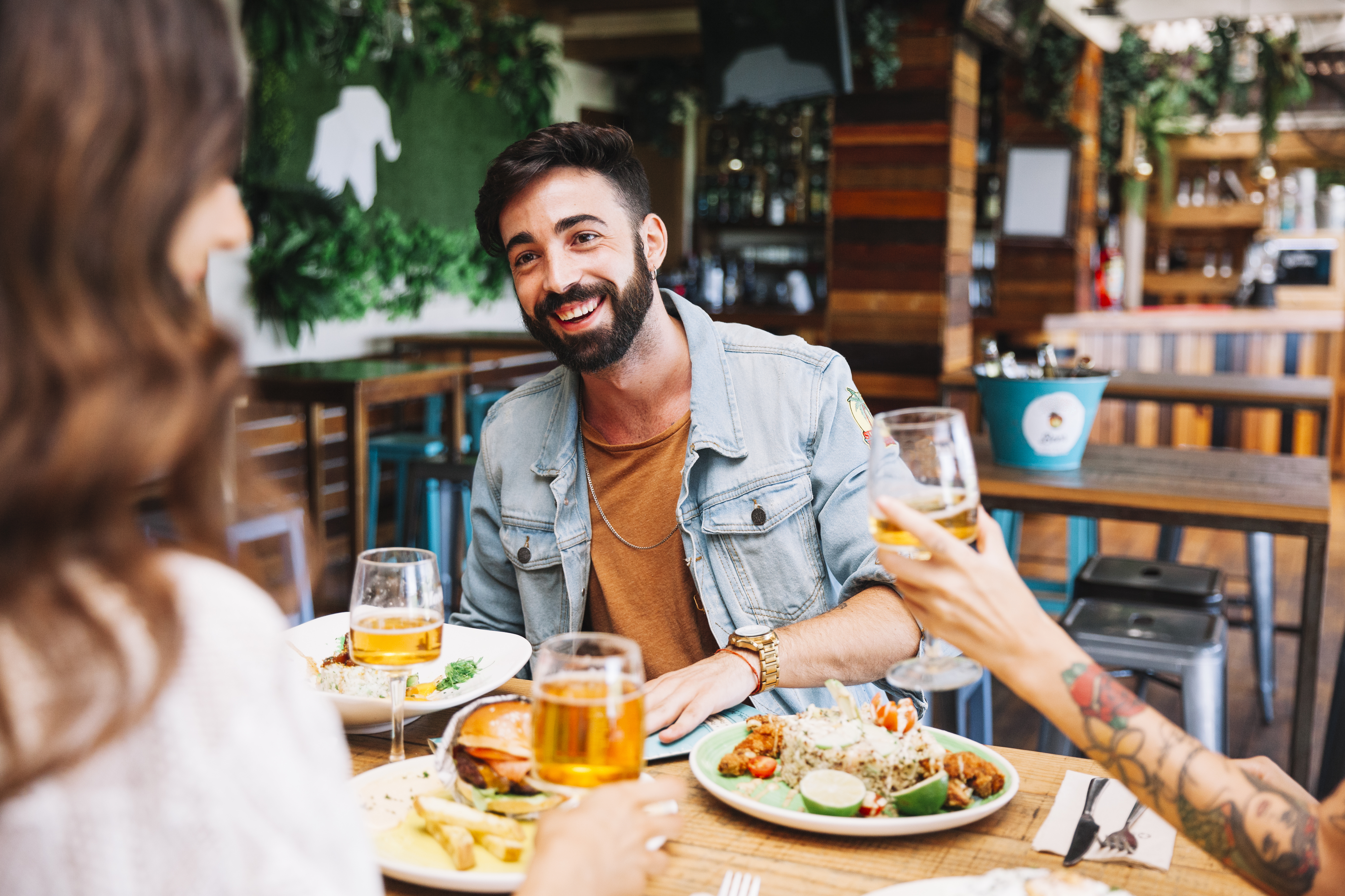 man-with-different-dishes-food